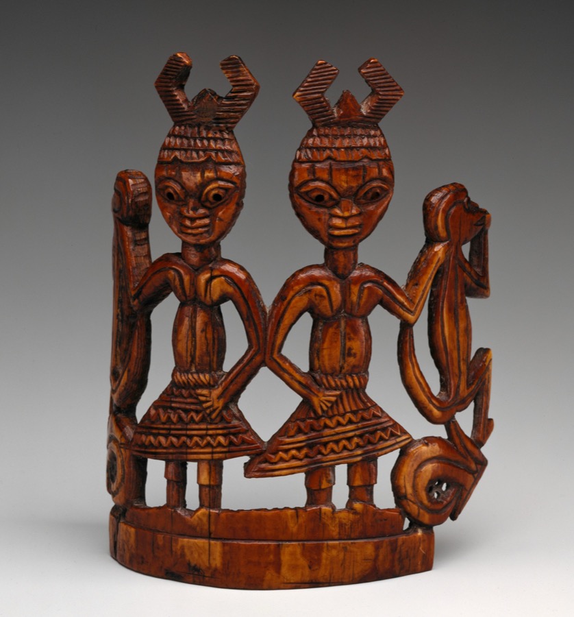 Paired copper-alloy figures from Ife, depicting a royal couple or deity figures, showing the full range of Ife naturalistic style